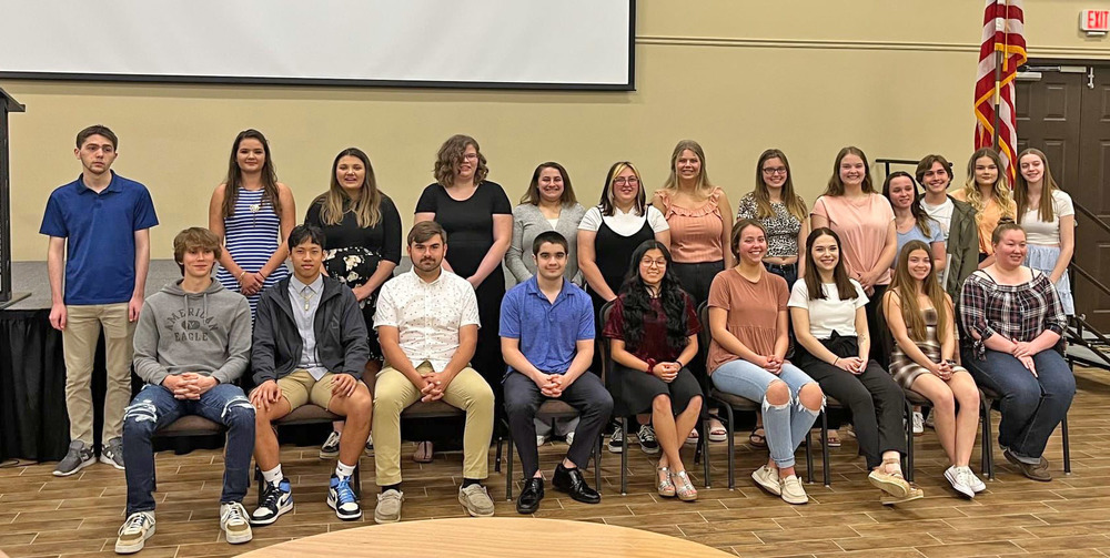 Photo of seniors at banquet, names in article