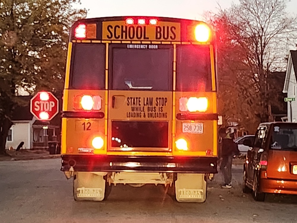 Bus 12 picks up students along Water Street on Wednesday morning. New bus routes will begin on Nov. 7 to improve efficiency as a measure to address an ongoing bus driver shortage. 