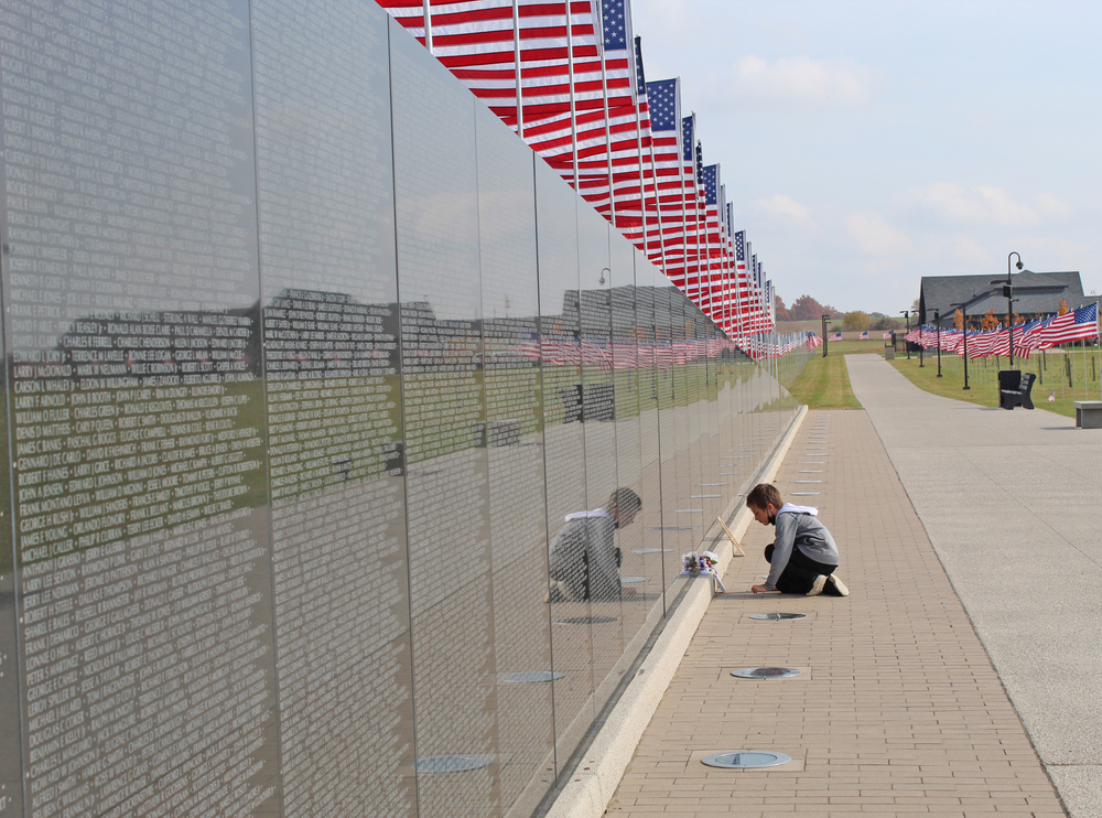 Child at the Vietnam Memorial Wall at MNVM