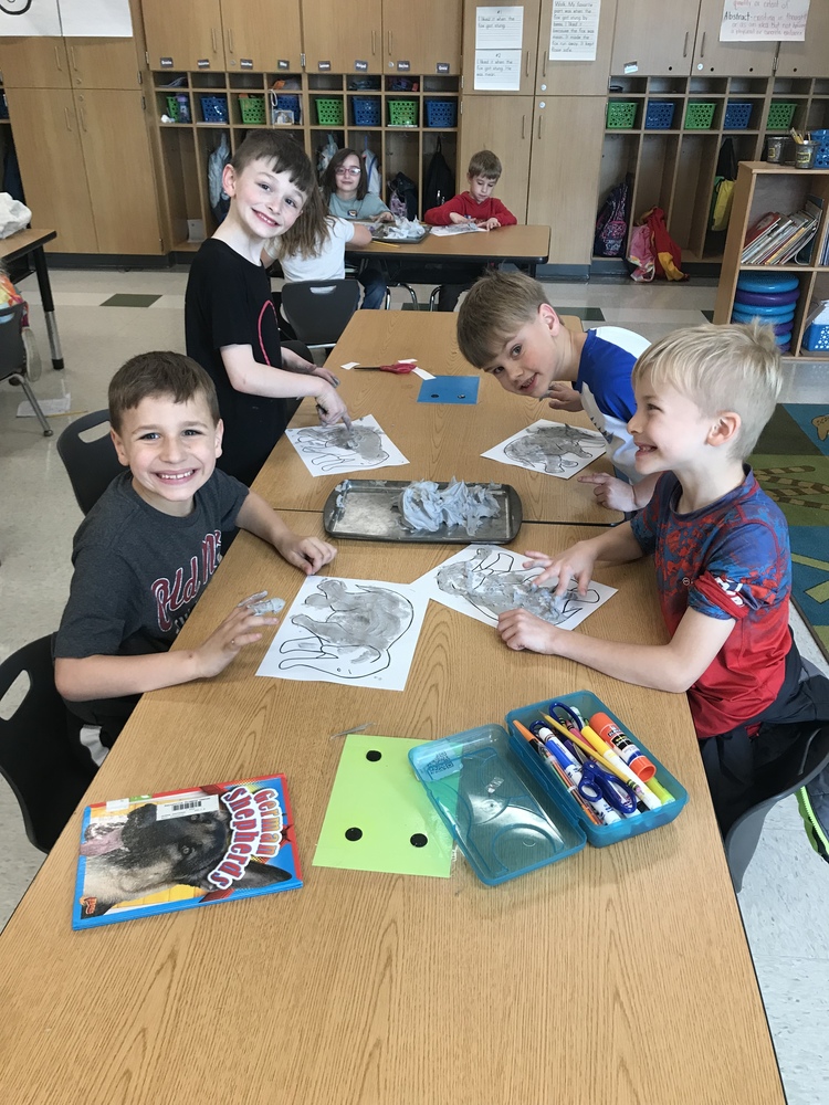 First graders writing about elephants